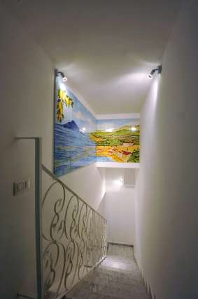 Dipinto su maiolica della suite Splendore del bed and breakfast Surriento Suites a Sorrento